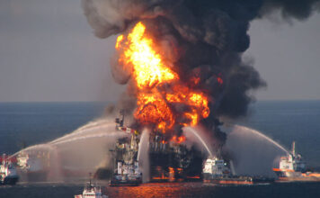 Fire boat response crews battle the blazing remnants of the off shore oil rig. Deepwater Horizon April 21, 2010. © United States Coast Guard (USCG)