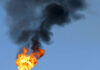 Gas flare on top of a flare stack at oil refinery / Photo: W.carter