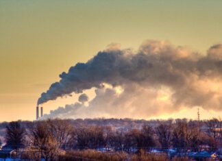 Emissions from fossil fuel burning include greenhouse gases, which act to warm the climate, as well as aerosols, which can block as well as absorb sunlight. © Mr. Nixer (CC BY-NC 2.0)