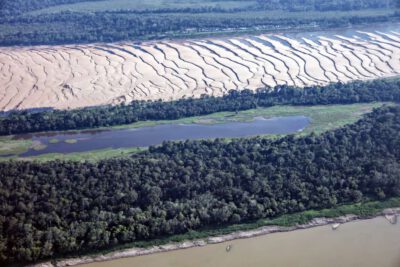 An aerial image of the surroundings of Tefé, impacted by the severe drought. In the beginning of October, Greenpeace Brazil first field trip as part of the Wings of Emergency 2023 project in Tefé, Amazonas state, taking humanitarian aid to the people most impacted by the historic drought in the Amazon Rainforest and offering logistic support to organizations researching the impacts on local fauna. © Marizilda Cruppe Greenpeace